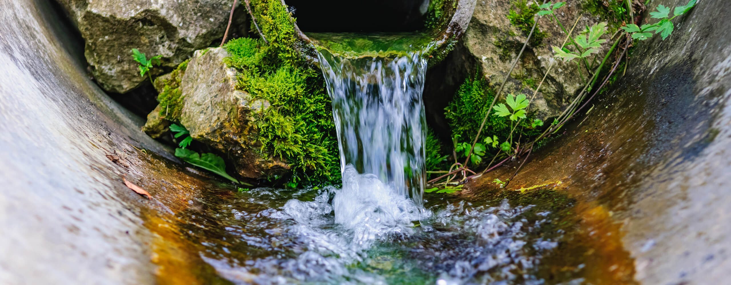 Stormwater drain flowing water
